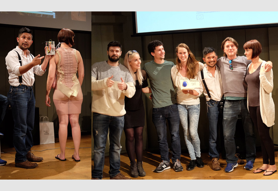 People on stage being presented an award