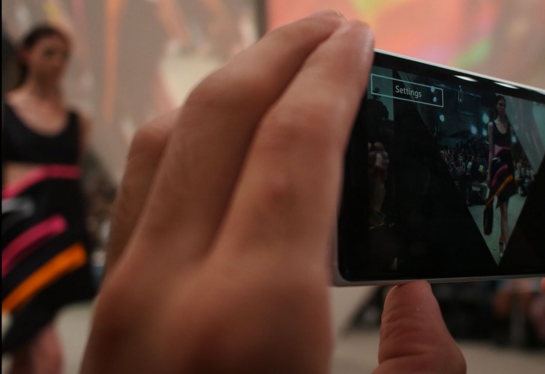 Phone with video recording of catwalk model