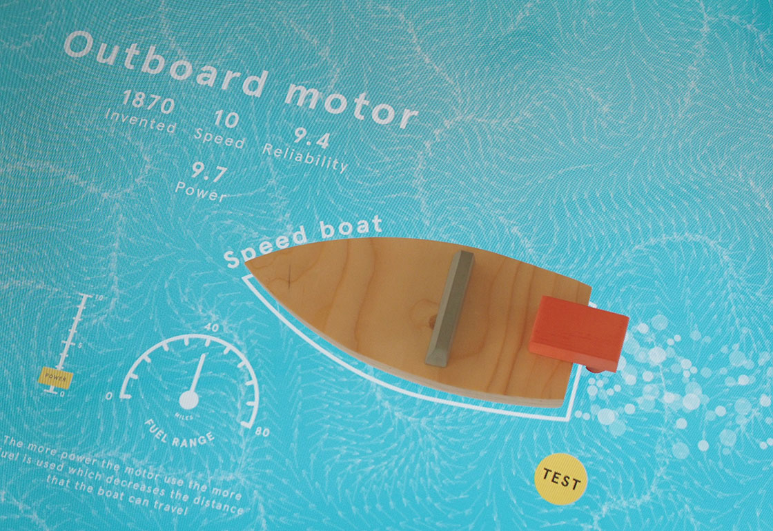 Wooden boat on a touchscreen