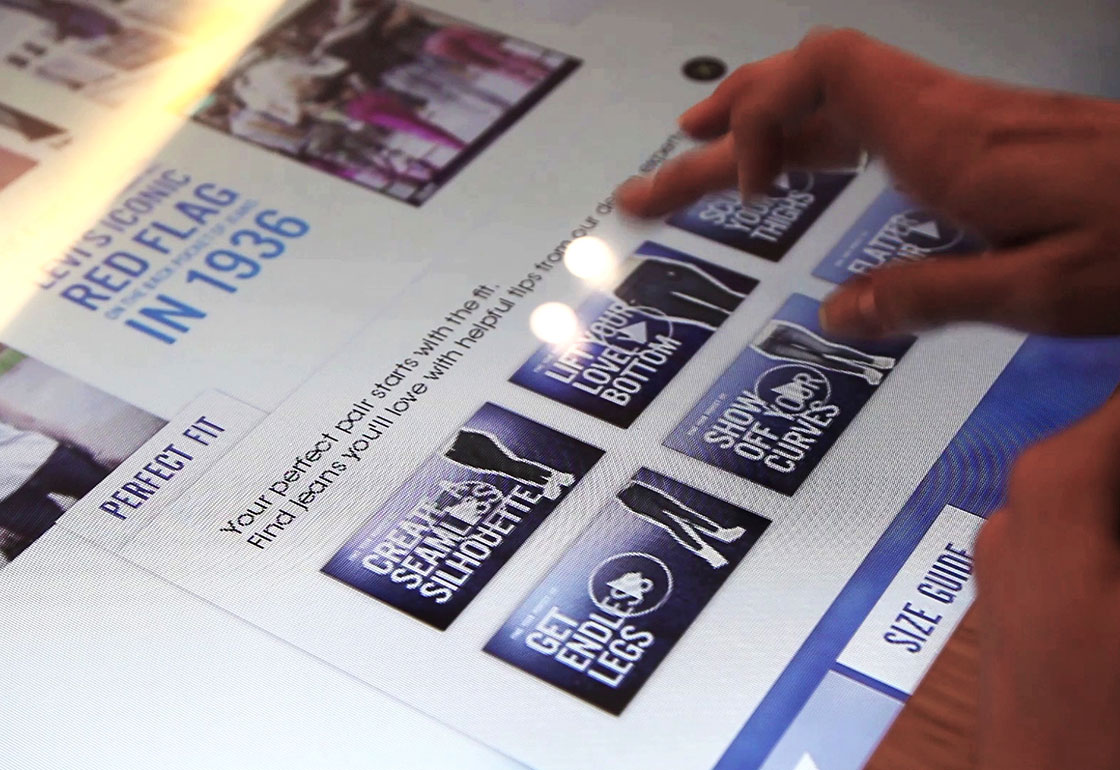 Hand interacting with a touchscreen