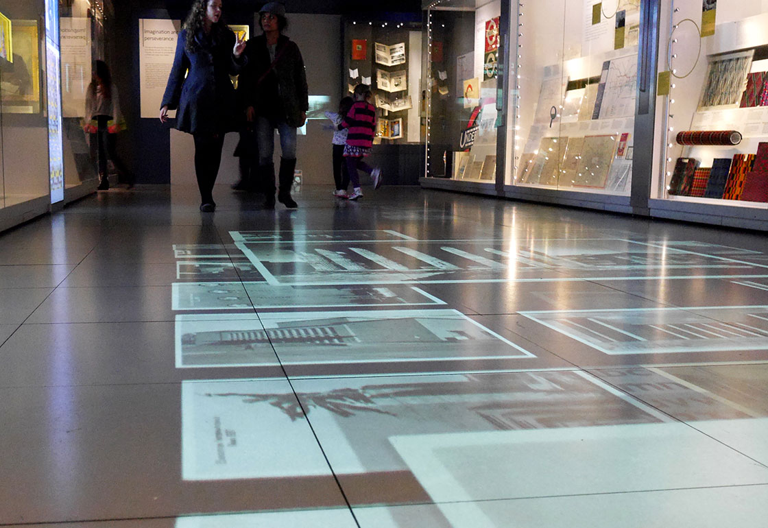 Projected archive images on the gallery floor